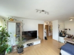 Offener Wohn- und Essbereich - Schöner Ausblick: Sonnige 2-Zimmer-DG-Wohnung mit zwei Balkonen & Kfz-Stellplatz in Cadolzburg