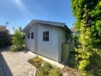 Gartenhaus - Top modernisierte Doppelhaushälfte mit neu angelegtem Garten & Garage in ruhiger Lage von Schnaittach