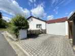 Hauszugang / Garage - Sonniges Einfamilienhaus mit herrlichem Garten & Garage in idyllischer Lage von Rupprechtstegen-OT