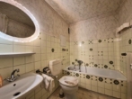 Bad - Über den Dächern: 1-Zimmer-Eigentumswohnung mit Sonnenloggia & Fernblick in Röthenbach a.d. Pegnitz
