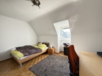 Schlafzimmer - Gemütliche 2-Zimmer-Dachgeschosswohnung in zentrumsnaher Lage von Lauf
