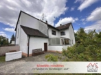 Hausansicht - Preiswerte Doppelhaushälfte mit Anbau und Garten – bereit für neue Ideen in Röthenbach a.d.Pegnitz