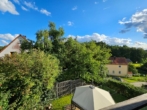 Balkonausblick - Anders als andere! Tolle 3-Zimmer-DG-Wohnung mit Wintergarten & Balkon in Neunkirchen-OT