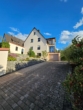 Außenansicht Bild 2 - Anders als andere! Tolle 3-Zimmer-DG-Wohnung mit Wintergarten & Balkon in Neunkirchen-OT