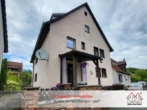 Hausansicht - Preiswertes Zweifamilienhaus in Simmelsdorf/Hüttenbach mit Garten und Nebengebäuden