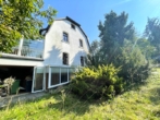 Ansicht Garten - Schmuckkästchen mit Altbau-Charme und Potential von 1919 in Henfenfeld zum Kauf