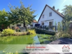 Außenansicht - Wie ein Haus am See: Einfamilienhaus (Bj. 1993) mit Traumgarten und Garage in Lauf-Kuhnhof