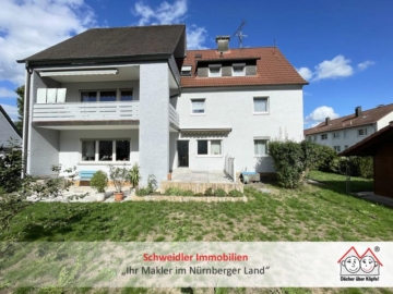 3 Wohnungen, 1 Haus, attraktiver Preis: Gepflegtes 3-Familienhaus mit Garage in Röthenbach, 90552 Röthenbach, Haus