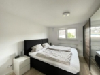 Schlafzimmer - Wohnen in der obersten Ebene! Schöne 3-Zimmer-DG-Wohnung mit Balkon & Garage in Neunkirchen-Speikern