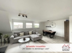 Wohn- und Esszimmer Ansicht 1 - Wohnen in der obersten Ebene! Schöne 3-Zimmer-DG-Wohnung mit Balkon & Garage in Neunkirchen-Speikern