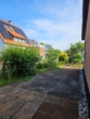 Terrasse - Charmanter, teilsanierter Bungalow in Neunkirchen mit Garage – ideal für Singles, Paare & Kleinfamilien