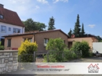 Außenansicht Bild 1 - Charmanter, teilsanierter Bungalow in Neunkirchen mit Garage – ideal für Singles, Paare & Kleinfamilien