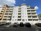 Hausansicht - Blick ins Grüne: 4-Zimmer-ETW mit Balkon, 2 Bädern und TG-Stellplatz in Nürnberg (3. OG mit Lift)