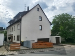 Ansicht Haus - Ihr neues Zuhause in Fischbach: Sonnige 2-Zimmer-Eigentumswohnung mit großzügigem Balkon!