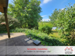 Terrassenausblick Bild 1 - Idyllisch wohnen am Rande von Lauf: Tolle 2,5-Zimmer-EG-Wohnung mit Gartenanteil & Garage
